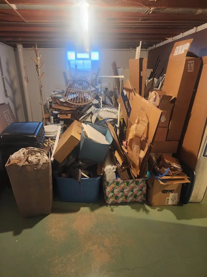 Roll-off dumpster container at job site for 15 Yard Dumpster Rental in Waunakee